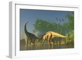 Spinophorosaurus Dinosaurs Grazing the Inhabited Swamps of the Jurassic Period-null-Framed Art Print