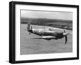 Spitfire in Flight-null-Framed Premium Photographic Print