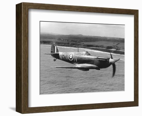 Spitfire in Flight-null-Framed Photographic Print