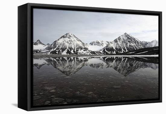 Spitsbergen, Svalbard, Norway. Mountains Reflecting on a Lagoon in Northern Spitsbergen-ClickAlps-Framed Stretched Canvas