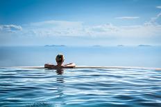 Woman Relaxing in Infinity Swimming Pool on Vacation-Splendens-Framed Stretched Canvas