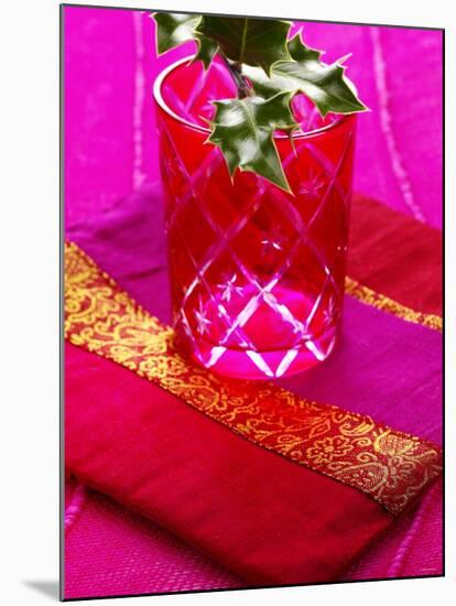 Sprig of Holly in Festive Red Glass on Cushion-Joff Lee-Mounted Photographic Print