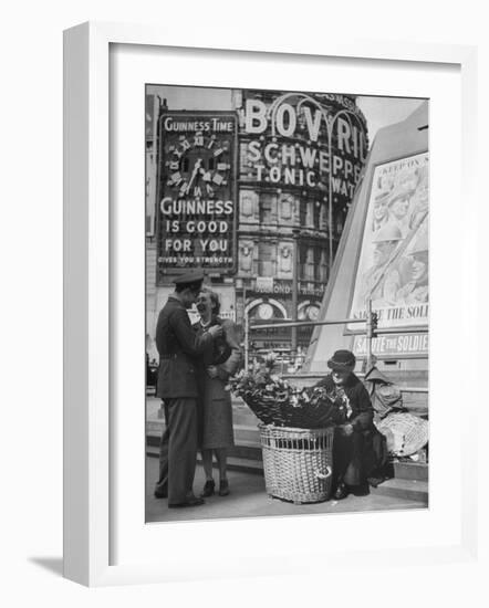 Springtime in England During WWII: Woman Selling Flowers in Circus Square-Ralph Morse-Framed Photographic Print