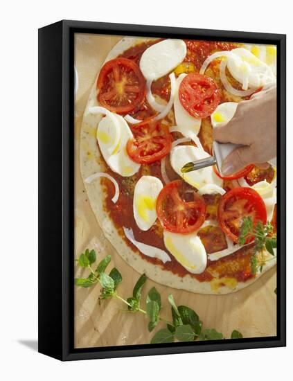 Sprinkling Pizza with Olive Oil-null-Framed Stretched Canvas