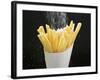 Sprinkling Salt over Chips-null-Framed Photographic Print