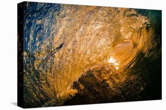 Spun Gold-Inside a tubing wave at sunset, shot from the water, Kirra, Queensland, Australia-Mark A Johnson-Stretched Canvas