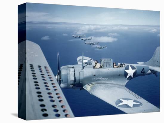 Squadron of Us Douglas Sbd-3 Dauntless in Flight as Patrolling Coral Reefs Off Midway Island, 1942-Frank Scherschel-Stretched Canvas