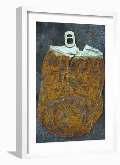 Squashed and Split Aluminium Drinks Can with Rusty Sides Lying on Tarnished Metal Sheet-Den Reader-Framed Photographic Print