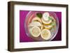 Squeezed Lemons in Water in Glass Bowl-Foodcollection-Framed Photographic Print