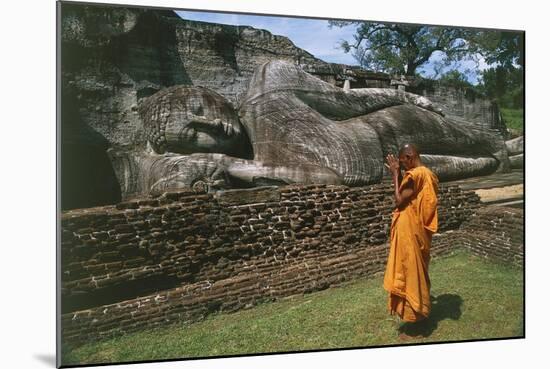 Sri Lanka, Ancient City of Polonnaruwa, Reclining Buddha Statue and Praying Monk-null-Mounted Giclee Print