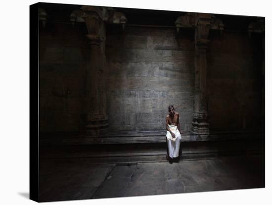 Sri Lankan Tamil Hindu Devotee Sits on Last Day of Tamil Year at a Hindu Temple in Sri Lanka-null-Stretched Canvas