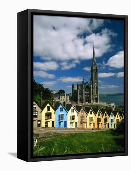 St. Coleman's Cathedral of Cobh Behind Colorful Row Houses-Charles O'Rear-Framed Stretched Canvas