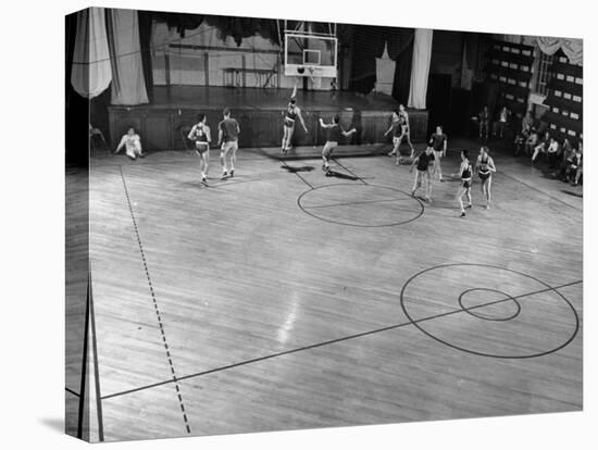 St. John's Basketball Team Members Practicing While their Coach Looks On-Ralph Morse-Stretched Canvas