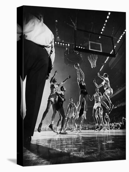 St. John's Defeating Bradley in a Basketball Game at Madison Square Garden-Gjon Mili-Stretched Canvas