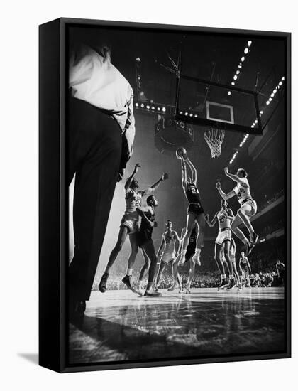 St. John's Defeating Bradley in a Basketball Game at Madison Square Garden-Gjon Mili-Framed Stretched Canvas