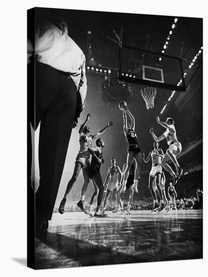 St. John's Defeating Bradley in a Basketball Game at Madison Square Garden-Gjon Mili-Stretched Canvas