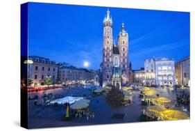 St. Mary's Basilica Illuminated at Twilight, Rynek Glowny (Old Town Square), Krakow, Poland, Europe-Kim Walker-Stretched Canvas