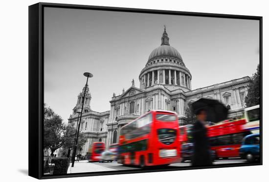 St Paul's Cathedral in London, the Uk. Red Buses in Motion and Man Walking with Umbrella.-Michal Bednarek-Framed Stretched Canvas