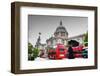 St Paul's Cathedral in London, the Uk. Red Buses in Motion and Man Walking with Umbrella.-Michal Bednarek-Framed Photographic Print