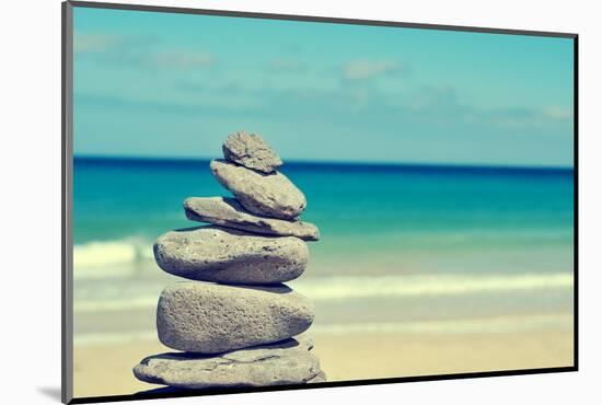 Stack of Balanced Stones in a White Sand Beach, with a Cross-Processed Effect-nito-Mounted Photographic Print