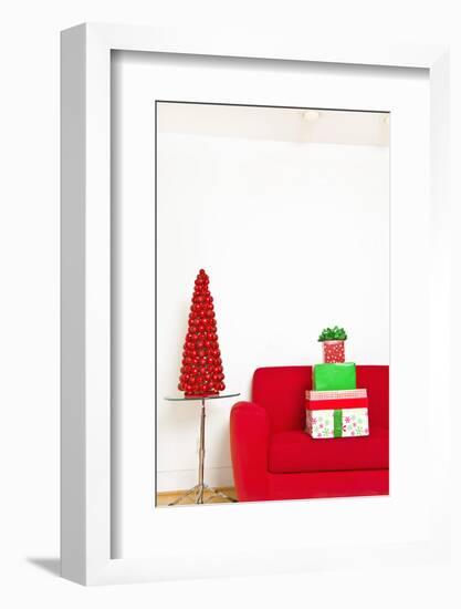 Stack of Christmas Gifts on Sofa-null-Framed Photographic Print