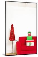 Stack of Christmas Gifts on Sofa-null-Mounted Photographic Print