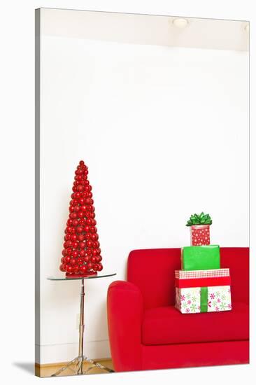 Stack of Christmas Gifts on Sofa-null-Stretched Canvas