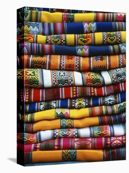 Stack of Colorful Blankets for Sale in Market, Peru-Jim Zuckerman-Stretched Canvas