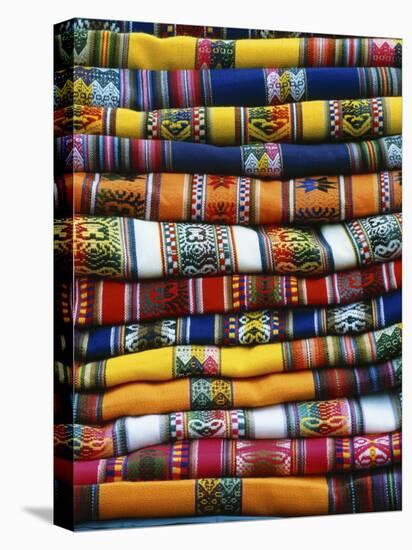 Stack of Colorful Blankets for Sale in Market, Peru-Jim Zuckerman-Stretched Canvas