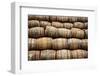 Stacked Pile of Old Whisky and Wine Wooden Barrels-MartinM303-Framed Photographic Print