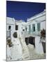 Stairs, Houses and Decorations of Chora, Cyclades Islands, Greece-Michele Molinari-Mounted Photographic Print