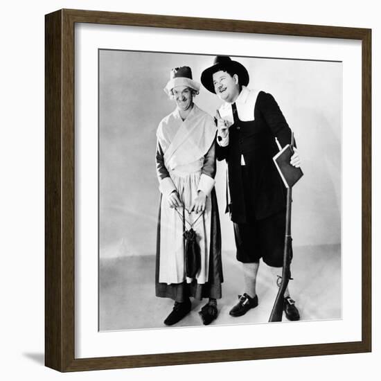 Stan Laurel and Oliver Hardy in a Thanksgiving-Themed Mgm Publicity Shot, Early 1930S-null-Framed Photo