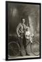 Standing Bicyclist with Little Girl on Handlebars-null-Framed Art Print