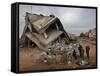 Standing in the Rubble of their Destroyed House, Palestinians Look Up at an Israeli Air Force Drone-null-Framed Stretched Canvas