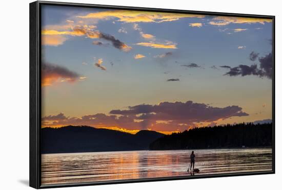 Standup Paddleboarder Silhouetted by Sunset, Whitefish Lake, Montana-Chuck Haney-Framed Photographic Print