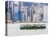 Star Ferry Crosses Victoria Harbour with Hong Kong Island Skyline Behind, Hong Kong, China, Asia-Amanda Hall-Stretched Canvas