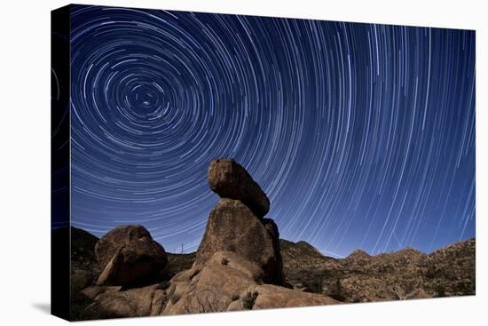 Star Trails Above a Granite Rock Formation in Cleveland National Forest, California-null-Stretched Canvas