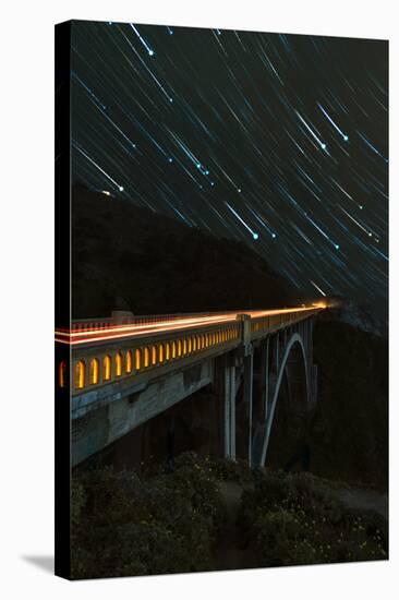 Star trails and light trails over the Big Sur's Bixby Creek Bridge near Monterey, California-David Chang-Stretched Canvas