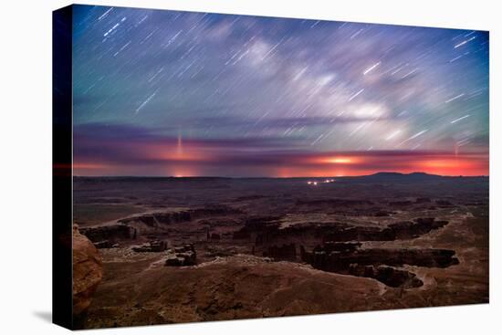 Star trails and Milky Way from Grand View point in Canyonland National Park near Moab, Utah-David Chang-Stretched Canvas