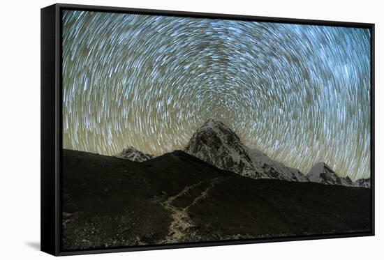 Star trails over Pumori Peak in the Himalayas, Nepal hiking to Everest Base Camp from Gorak Shep-David Chang-Framed Stretched Canvas
