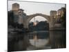 Stari Most Peace Bridge and Reflection of Mosque on Neretva River, Bosnia, Bosnia-Herzegovina-Christian Kober-Mounted Photographic Print