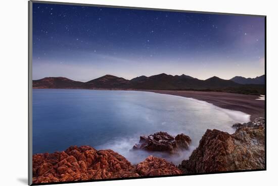 Starry sky above the beach at the mouth of Fango river at Bocca Bassa, Corsica, France-null-Mounted Art Print