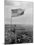 Stars and Stripes Wave over the Summit of Mt. Suribachi on Iwo Jima-null-Mounted Photo