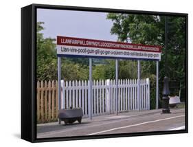 Station Sign at Llanfairpwllgwyngyllgo-Gerychwyrndrobwllllantysiliogogogoch-Nigel Blythe-Framed Stretched Canvas