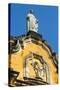 Statue Atop the Baroque Facade of the Iglesia De La Recoleccion Church-Rob Francis-Stretched Canvas