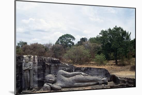 Statue Carved in Rock Depicting Sleeping Buddha-null-Mounted Giclee Print