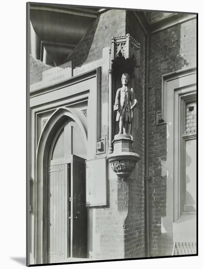 Statue of a Boy Scholar Beside the Door, Hamlet of Ratcliff Schools, Stepney, London, 1945-null-Mounted Photographic Print
