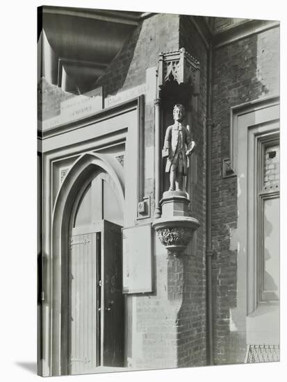 Statue of a Boy Scholar Beside the Door, Hamlet of Ratcliff Schools, Stepney, London, 1945-null-Stretched Canvas