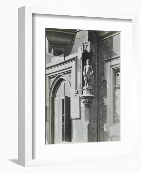 Statue of a Boy Scholar Beside the Door, Hamlet of Ratcliff Schools, Stepney, London, 1945-null-Framed Photographic Print