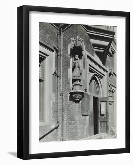 Statue of a Girl Scholar Beside the Door, Hamlet of Ratcliff Schools, Stepney, London, 1945-null-Framed Photographic Print